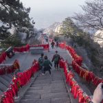 students descending staircase
