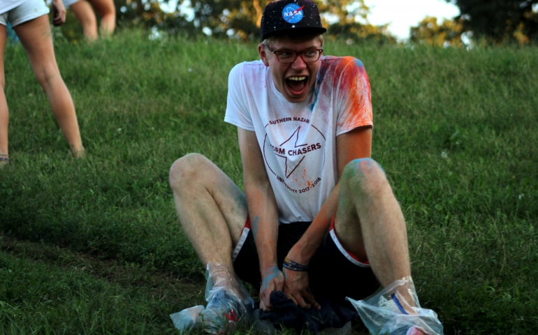 Andrew Marston sliding down the hill on ice