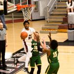 Jhnoathan going up for a backwards lay up