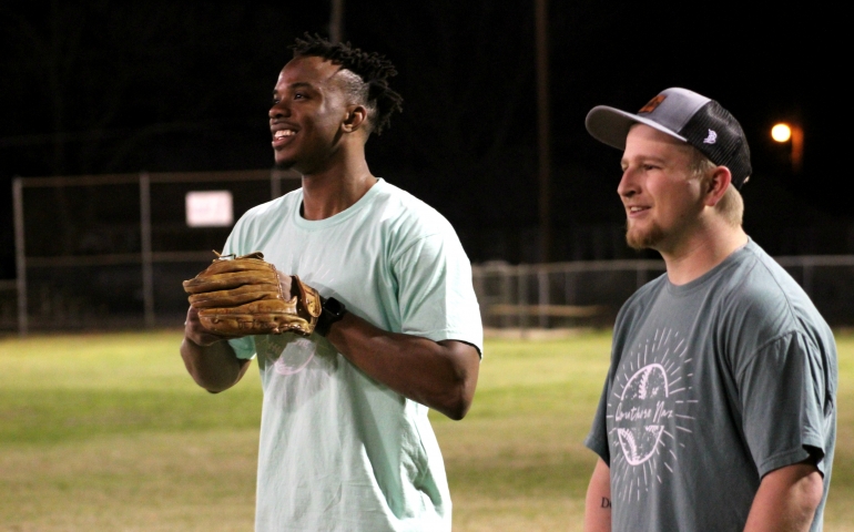 Two students talking during the game