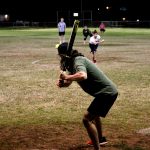 A student getting ready to hit the ball
