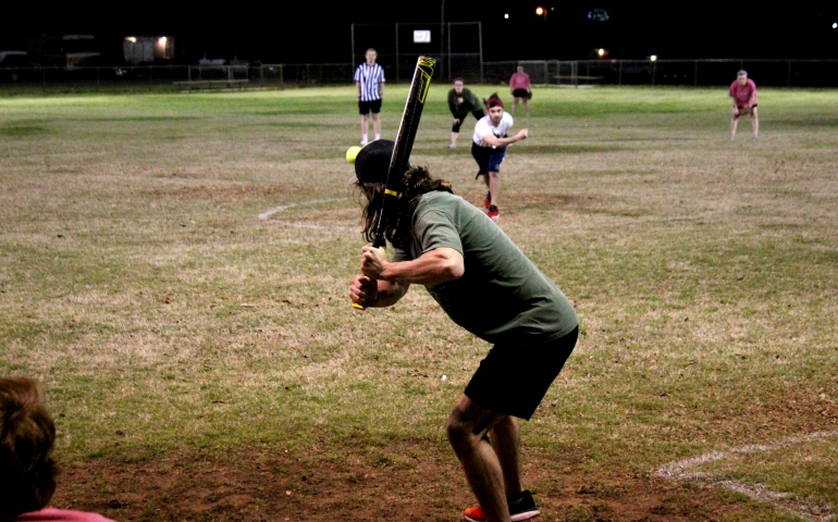 A student getting ready to hit the ball
