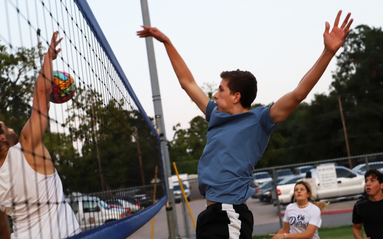 Guy spiking the ball