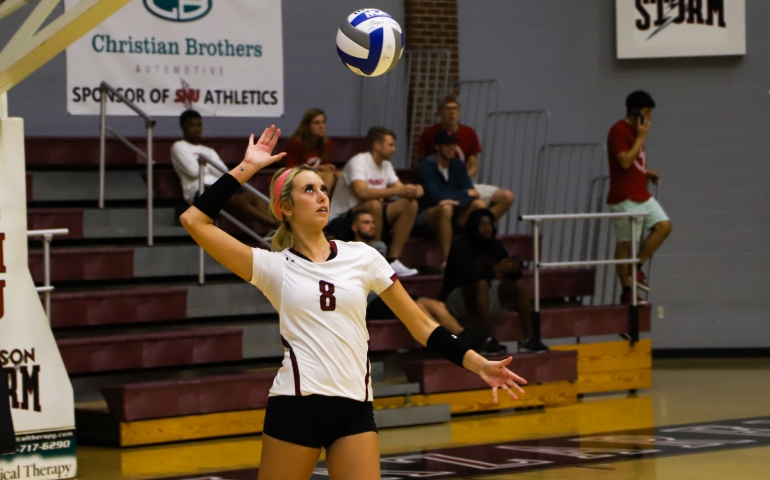 Volleyball player serving