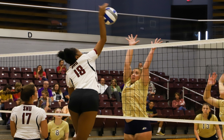 Volleyball player spiking