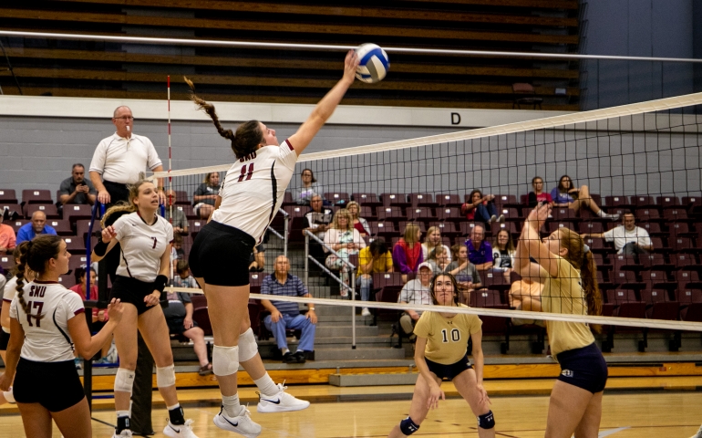 Volleyball player spiking