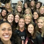 The women's volleyball team in a group selfie