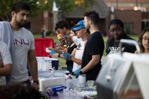 A group of students getting food at Amigos Unidos