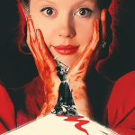 Movie poster for Pearl: featuring a smiling bloody woman behind the silhouette of her holding an axe